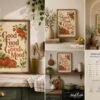Good Food Good Mood printable wall art displayed in a warm, cozy kitchen, featuring vintage orange typography, tomatoes and green botanical details in a natural wood frame.