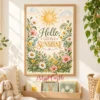 Hello Little Sunshine floral wall art displayed in a bright nursery reading corner