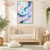Pastel galaxy wall-art set displayed above furniture in a child’s bedroom